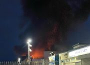 Travel disruption as massive fire engulfs area near London station